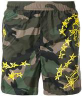 Thumbnail for your product : Valentino camouflage print swim shorts