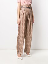Thumbnail for your product : Fendi high-waisted Karligraphy motif printed trousers