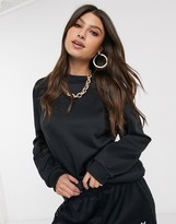 Thumbnail for your product : adidas Bellista lace insert oversized sweatshirt in black