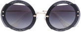 Miu Miu Eyewear - glitter effect round frame sunglasses