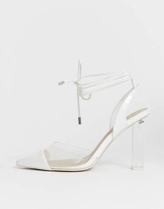 ASOS Design DESIGN Pucker Up tie leg pointed high heels in white/clear