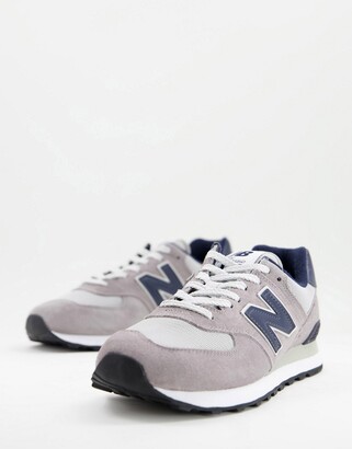 New Balance 574 trainers in grey and navy