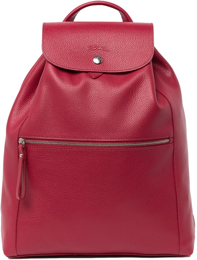red leather backpack purse