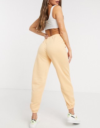 ASOS DESIGN lounge jogger in washed peach