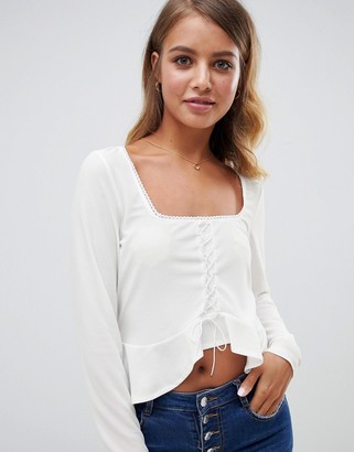 ASOS DESIGN square neck long sleeve top with ruffle and lace up