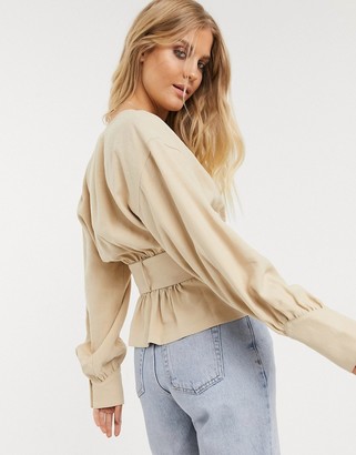 Only wrap top with belt detail in tan