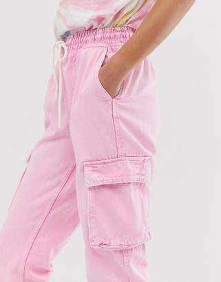 Bershka cargo pant with pocket detail in pink