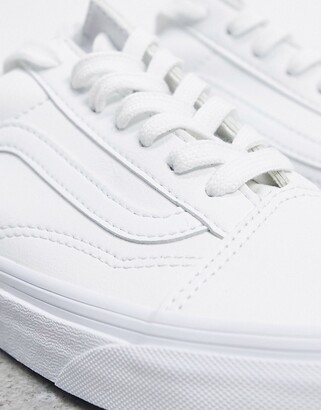 white faux leather vans