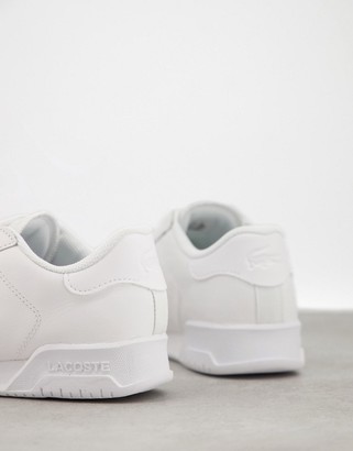 Lacoste Twin Serve cupsole plimsoll trainers in white