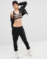 Thumbnail for your product : Reebok Logo Front Medium Support Sports Bra In Metallic