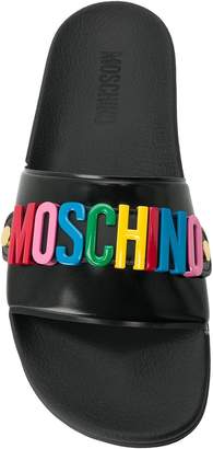 Moschino logo slides