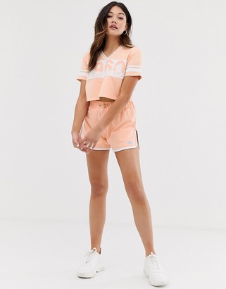 Lonsdale London cropped varsity v neck t-shirt in peach
