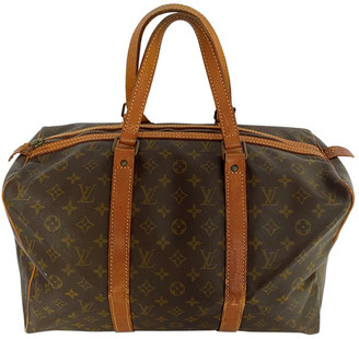 Louis Vuitton Sac souple Brown Cloth Travel bags
