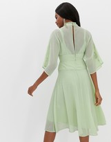 Thumbnail for your product : ASOS DESIGN embroidered high neck 70s midi dress