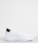 Thumbnail for your product : Truffle Collection wide fit flatform sneakers in white