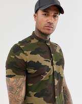 Thumbnail for your product : Bershka Join Life Organic Cotton short sleeved shirt with grandad collar in camo-Green