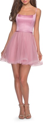 light pink fit and flare dress with sleeves