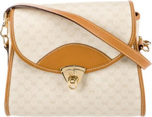Gucci Crossbody Bag Neutrals Printed Micro GG Monogram Gold-Tone Hardware Leather Trim Single Shoulder Strap Leather Trim Embellishment & Single Exterior Pocket Leather Lining & Single Interior Pocket Pull-Through Closure at Front Includes Dust Bag