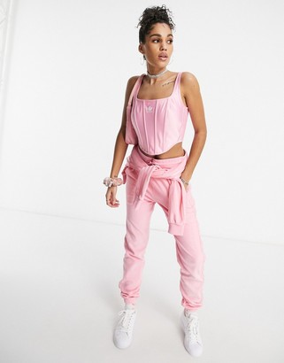 adidas Relaxed Risqué satin look corset in vibrant pink
