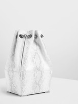 Thumbnail for your product : Charles & Keith Chain Handle Snake Print Bucket Bag