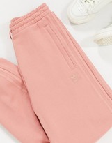 adidas originals new neutrals logo cuffed joggers in pink