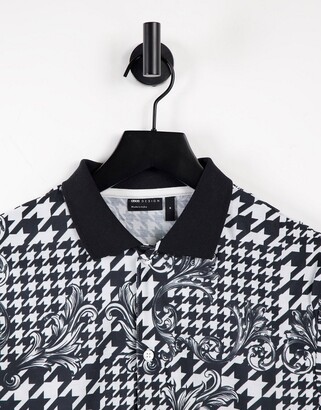 ASOS DESIGN polo shirt in dogstooth & baroque all over print