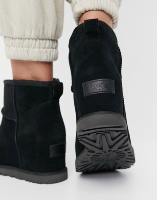 UGG Classic Femme Mini wedge heel boots in black - ShopStyle