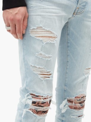 Amiri Distressed Printed-patch Skinny-leg Jeans - Blue
