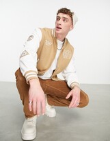 Thumbnail for your product : ASOS DESIGN oversized varsity bomber jacket with embroidery in tan