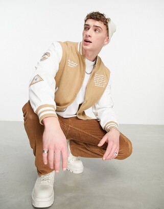 ASOS DESIGN oversized varsity bomber jacket with embroidery in tan
