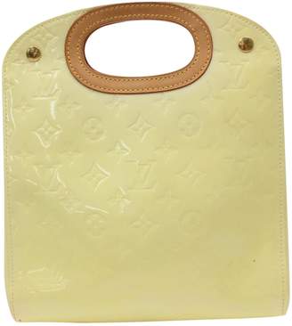 Louis Vuitton Beige Patent leather Handbags