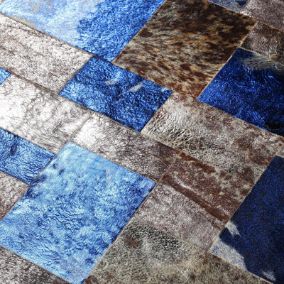 Loon Peak Blue Leaf Cowhide Patchwork Rug