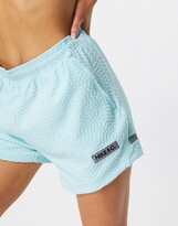 Thumbnail for your product : Nike FC track shorts in multi