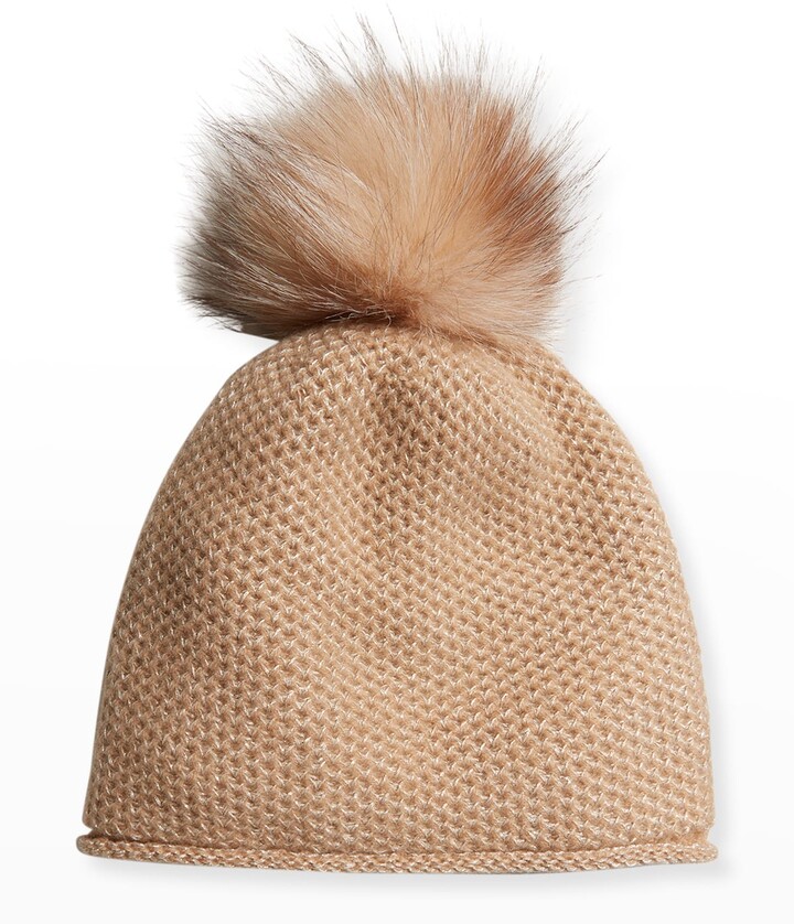 pom pom on beanie origin