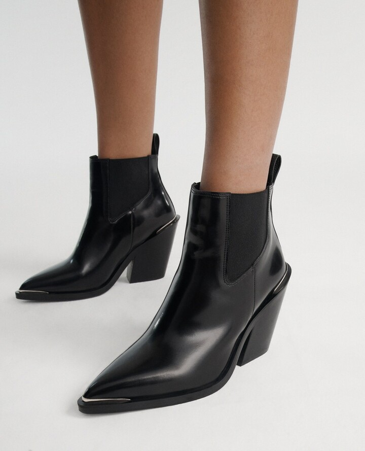 glossy black boots