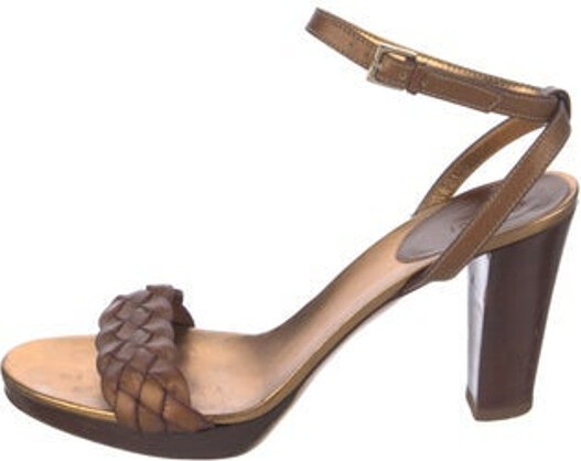 Gucci Leather Sandals Brown Braided Accents Wrap-Around Straps & Buckle Closure at Ankles Unfortunately, due to restrictions, this item may not be eligible for shipping in all areas.