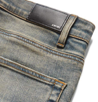 Amiri Mx1 Skinny-Fit Rib-Panelled Distressed Stretch-Denim Jeans