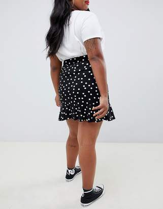 ASOS Curve DESIGN Curve mini wrap skirt in polka dot print