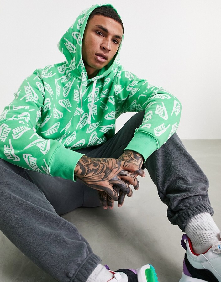 Nike Sport Essentials all over logo print fleece hoodie in green - ShopStyle