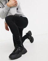 Thumbnail for your product : ASOS DESIGN super skinny joggers in black with silver zip cuffs