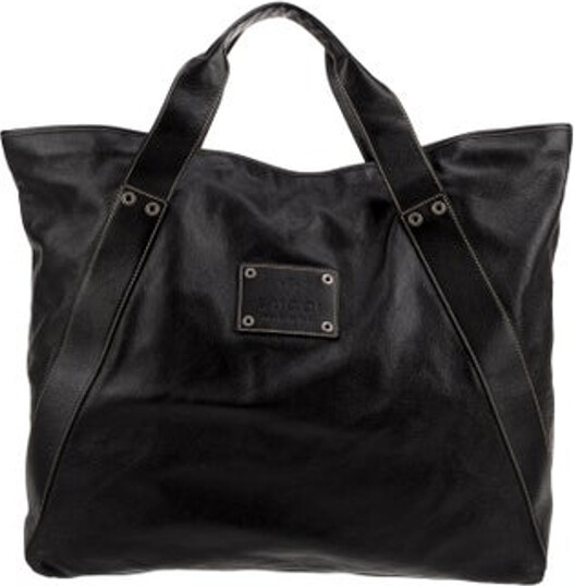 Gucci Tote Black Leather Silver-Tone Hardware Flat Handles Logo Jacquard Lining & Dual Interior Pockets Open Top Includes Dust Bag Unfortunately due to restrictions this item may not be eligible for shipping in all areas.