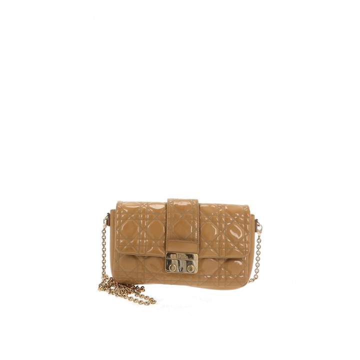 beige patent clutch bag