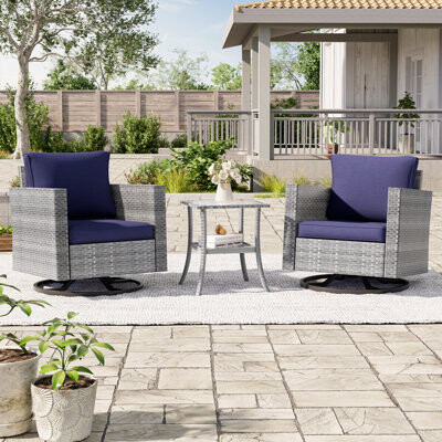Ebern Designs Dossena Swivel Conversation 3 Piece Rattan Seating Group with Cushions