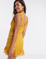Thumbnail for your product : ASOS DESIGN mini dress with eyelet trim and embroidery