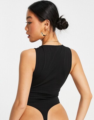 ASOS Petite ASOS DESIGN Petite side boob bodysuit in black - ShopStyle Tops