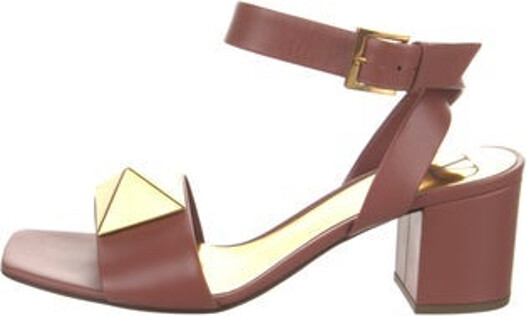 Valentino Leather Sandals Pink Rockstud Accents Wrap-Around Straps & Buckle Closure at Ankles Includes Box & Dust Bag Unfortunately due to restrictions this item may not be eligible for shipping in all areas.