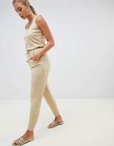 Thumbnail for your product : Missguided sleeveless tie waist jumpsuit in beige