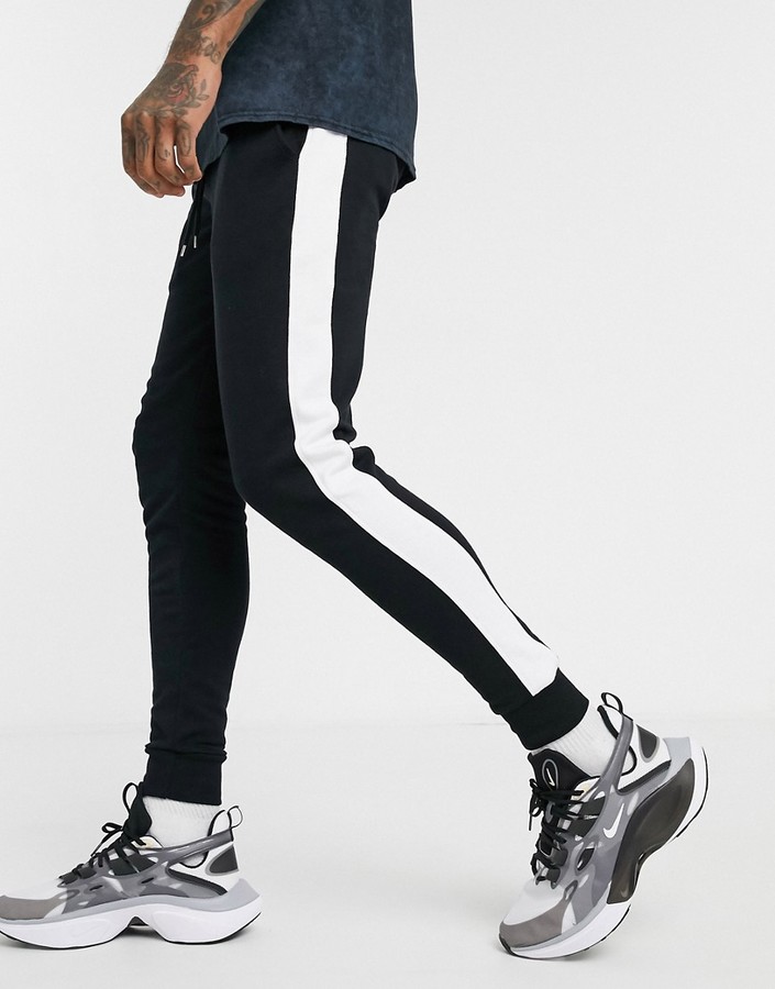 ASOS DESIGN skinny sweatpants with side stripe - ShopStyle