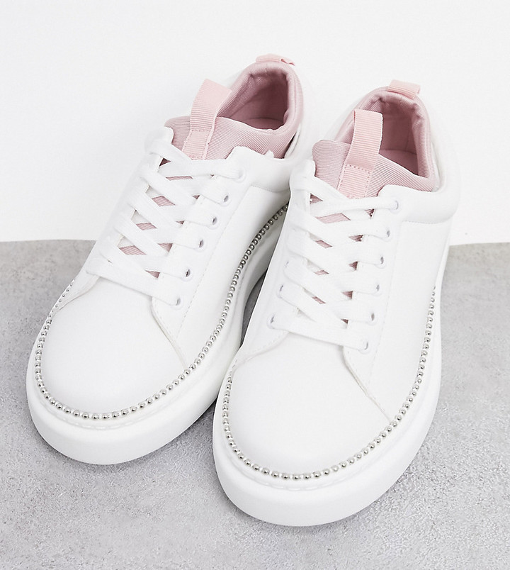 ASOS DESIGN Wide Fit Varied chunky lace up trainers in white/pink
