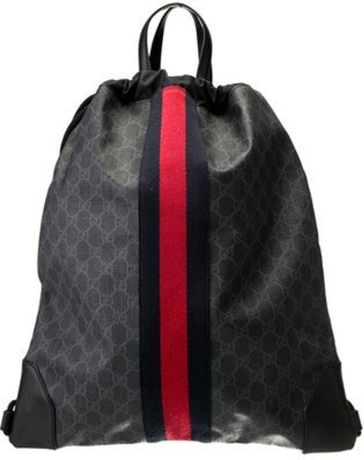 Gucci Backpack Black GG Supreme & Web Accent Leather Trim Flat Handles & Dual Adjustable Shoulder Straps Leather & Grosgrain Accents Nylon Lining & Single Interior Pocket Drawstring Closure at Top